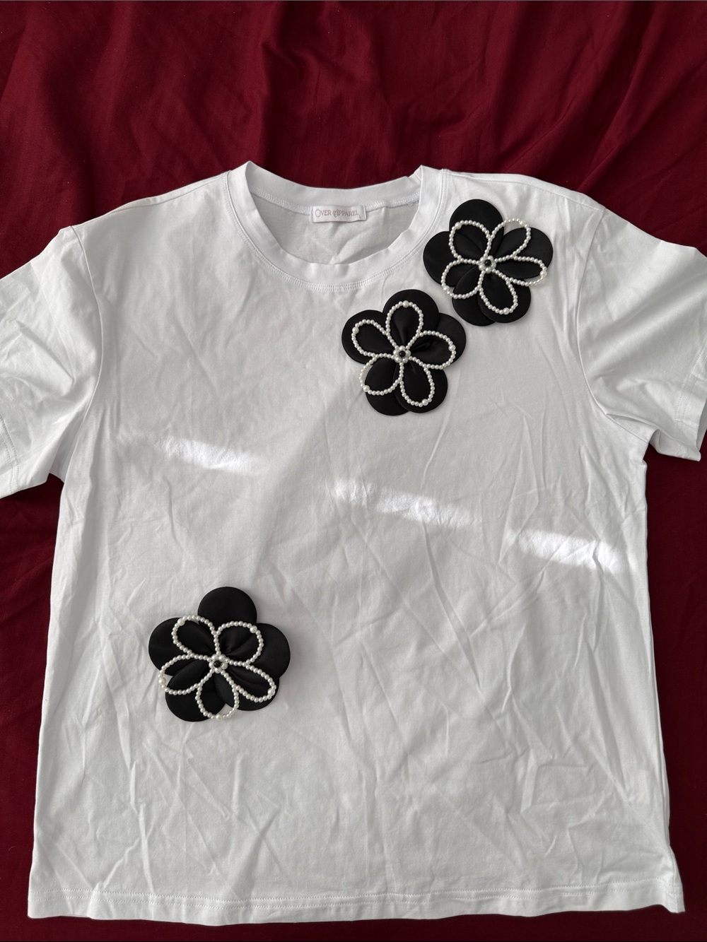 White Short-Sleeve Tee with Black Pearl Flower Appliqués